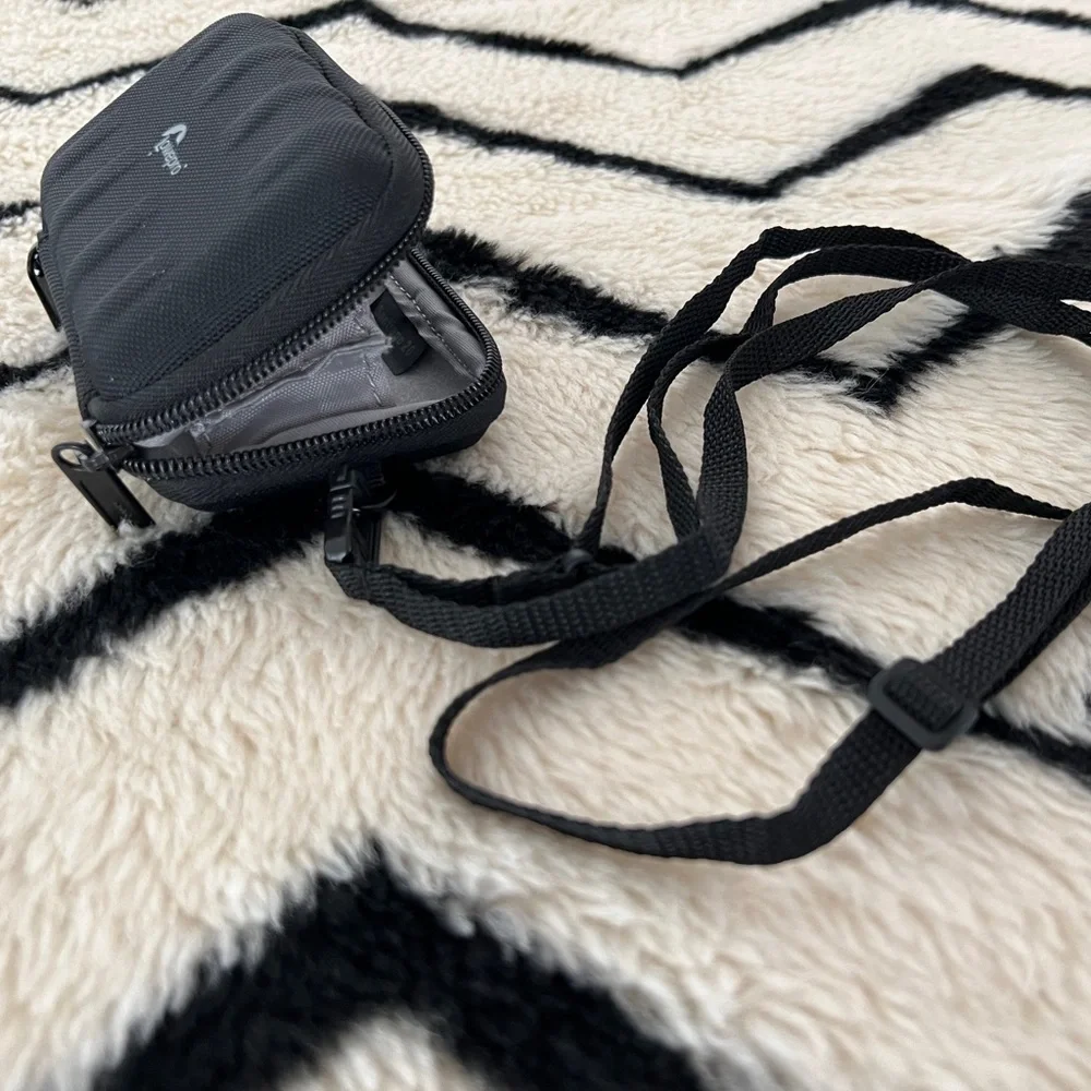 Black Camera Bag by Lowepro EUC. Includes crossbody strap.